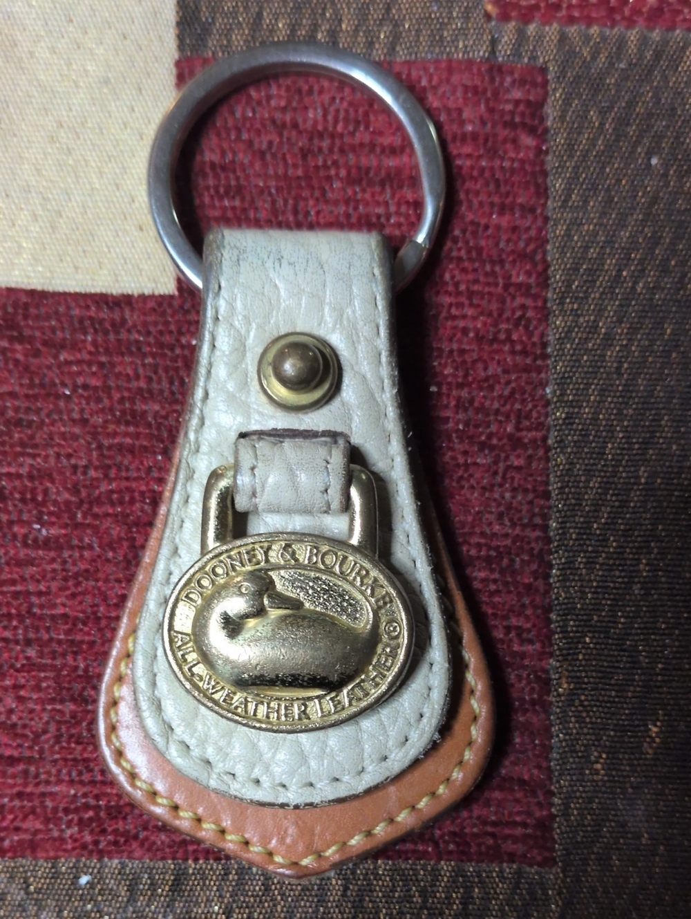 Dooney & Bourke White and Brown Leather Key Holder with Brass Medallion